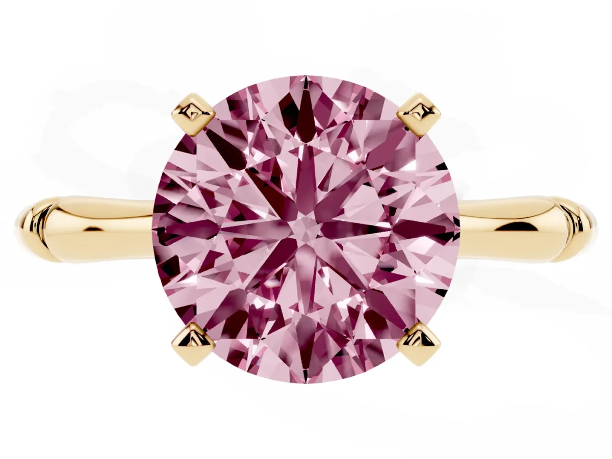 Fancy Pink Round Cut Solitaire Diamond Ring with Bamboo Band and Four-Prong Setting Yellow gold