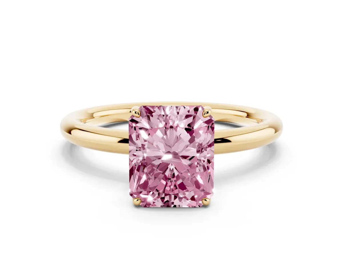 Fancy Pink Radiant Cut Solitaire Diamond Ring with Four-Prong Setting on a Plain Band Yellow gold
