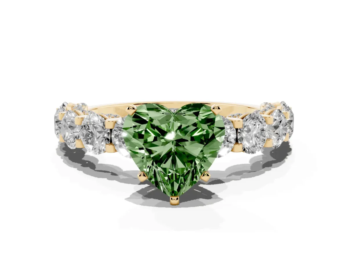 Fancy Green Heart Cut Diamond Side Stone Engagement Ring with Four-Prong Setting Yellow gold