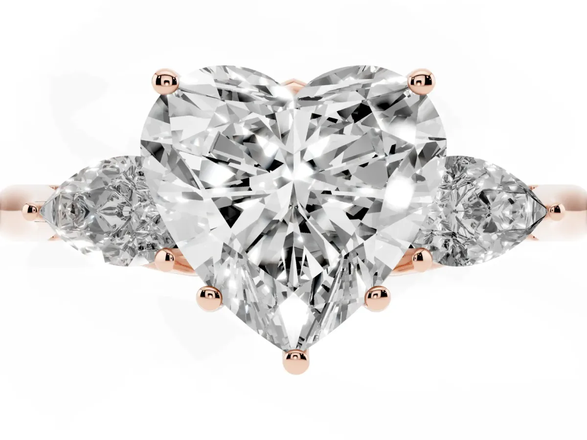 Three-Stone Heart Cut Brilliant Diamond Solitaire Ring with Tapered Band and Four-Prong Setting Rose gold