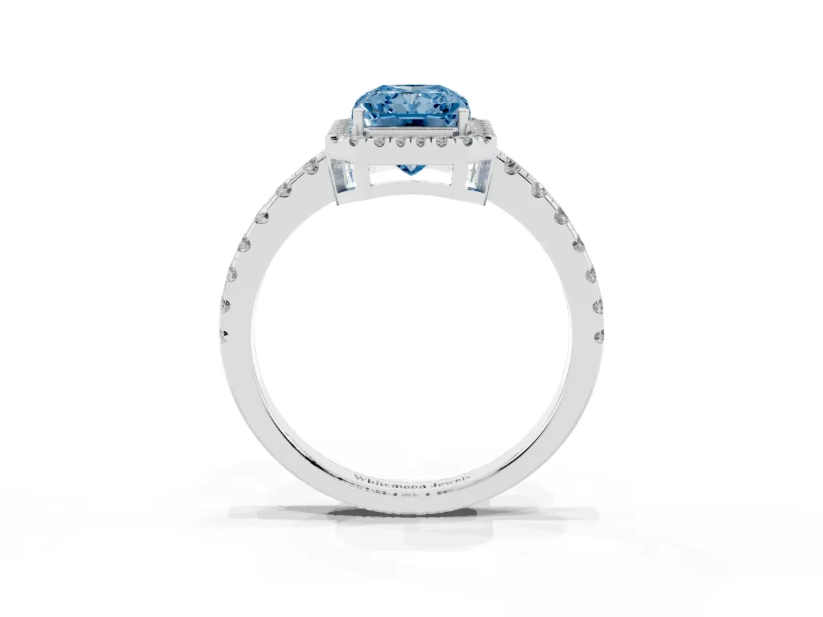 Fancy Blue Radiant Cut Diamond Halo Ring with Pavé Band and Four-Prong Setting White gold