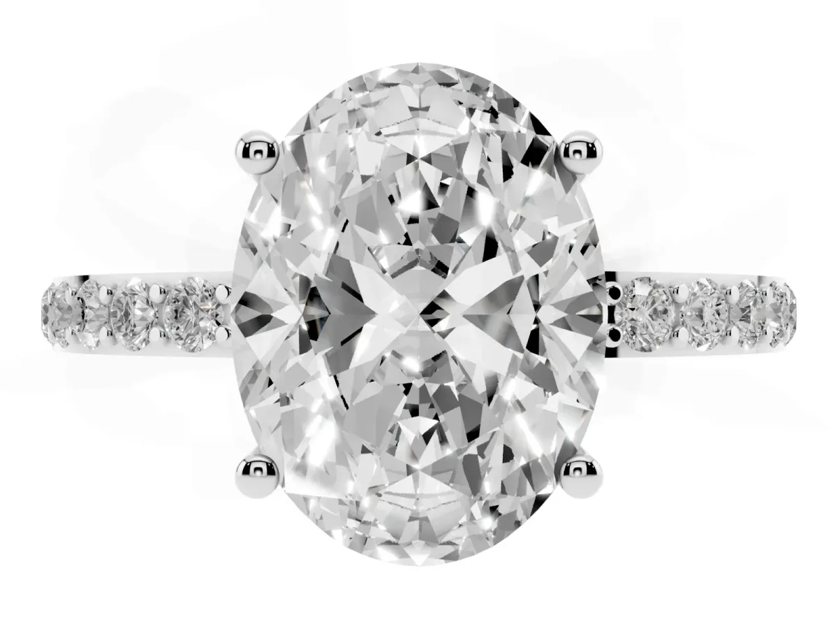 Oval Cut Diamond Solitaire Ring with Round Pavé Shoulders and Prong Setting Platinum