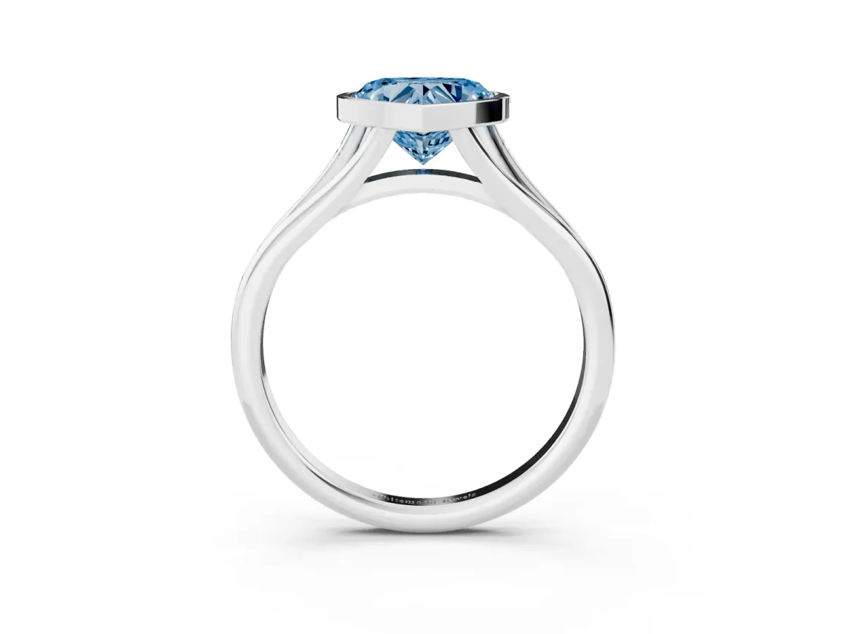 Fancy Blue Bezel Set Heart Cut Cut Solitaire Ring with Tapered Band White gold