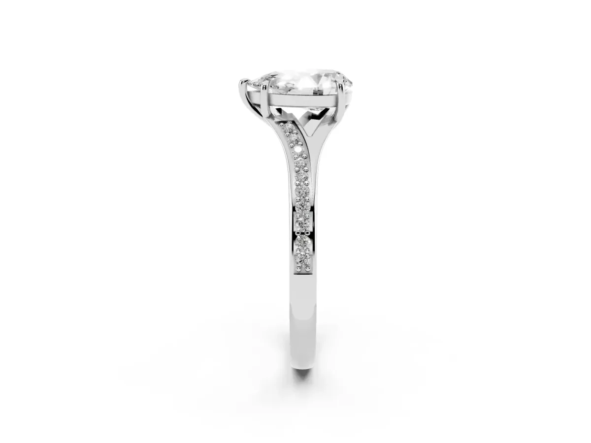 Pear Cut Diamond Solitaire Ring with Pavé Band and Prong Setting Silver