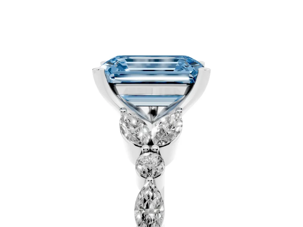 Fancy Blue Emerald Cut Diamond Solitaire Ring with Side Stones and Four-Prong Setting Platinum