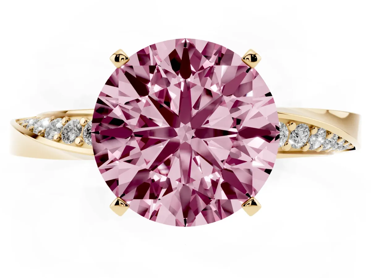 Fancy Pink Round Cut Diamond Engagement Ring with Side Stone Accents and Four-Prong Setting Yellow gold