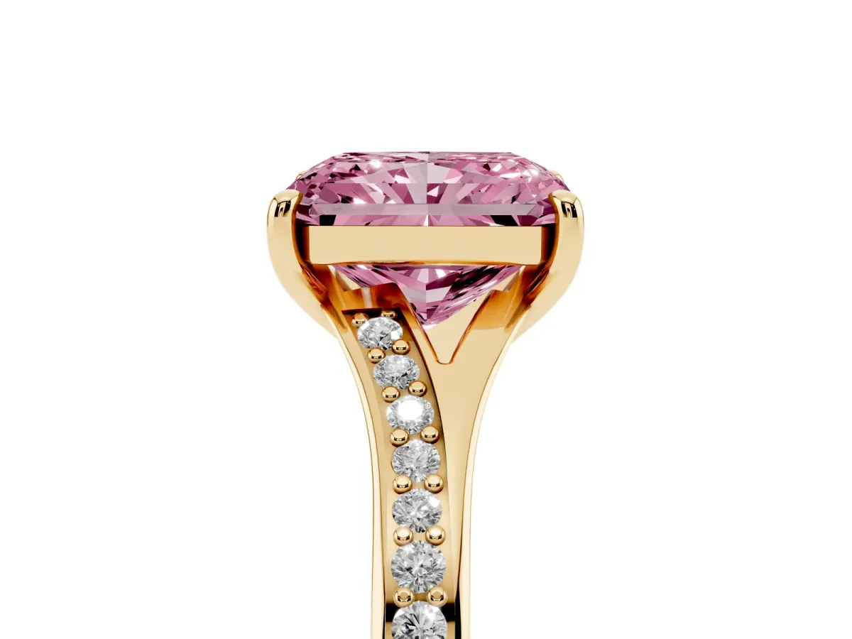 Fancy Pink Radiant Cut Diamond Solitaire Ring with Pavé Band and Prong Setting Yellow gold