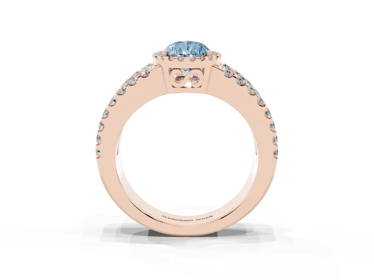 Fancy Blue Pear Cut Cut Halo Split Shank Diamond Ring with Four-Prong Setting Rose gold