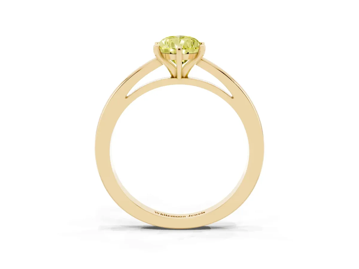 Fancy Yellow Pear Cut Solitaire Diamond Engagement Ring with Four-Prong Setting on a Classic Band Yellow gold