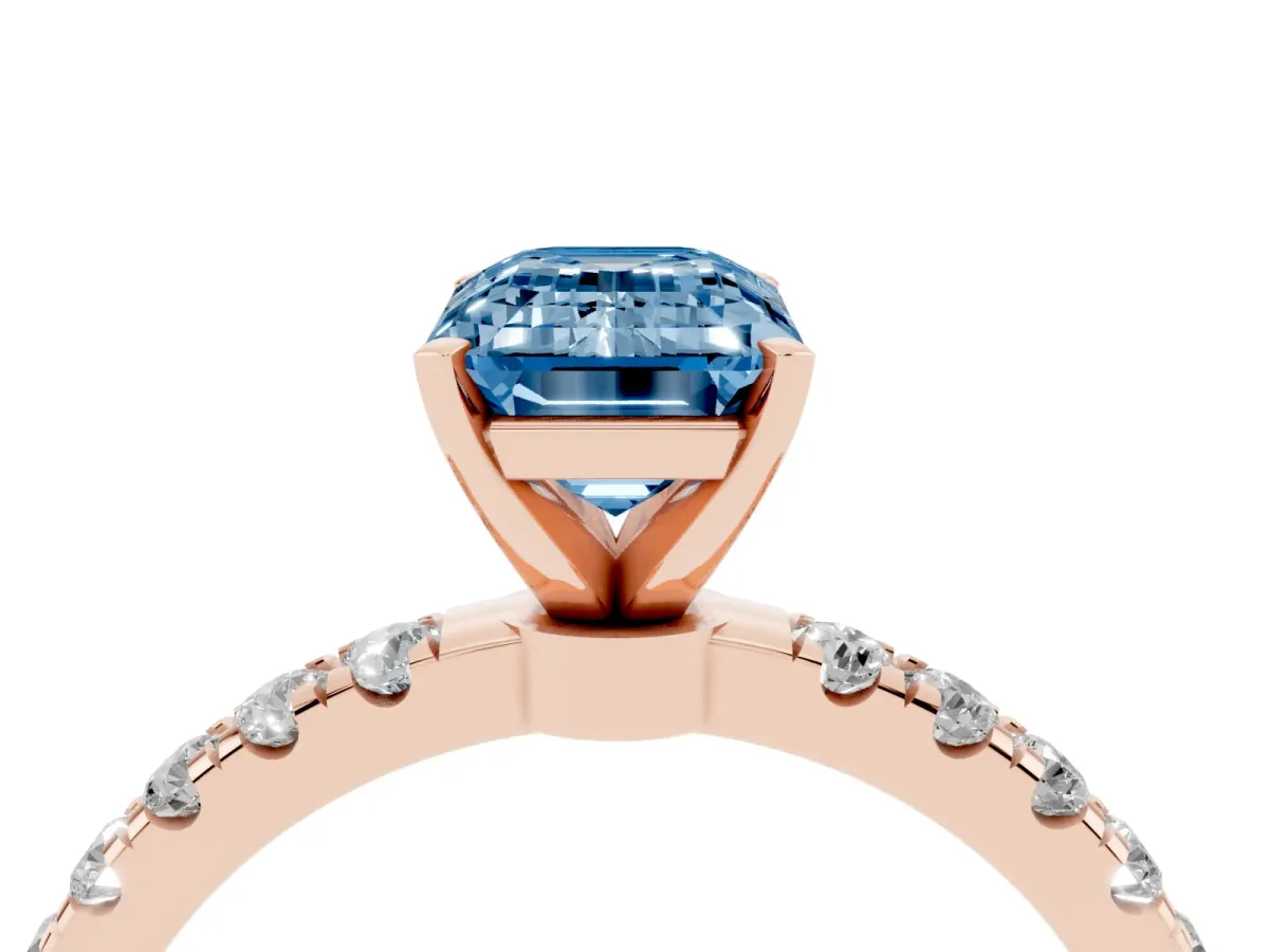 Fancy Blue Emerald Cut Diamond Solitaire Ring with Pavé Accents and Four-Prong Setting Rose gold