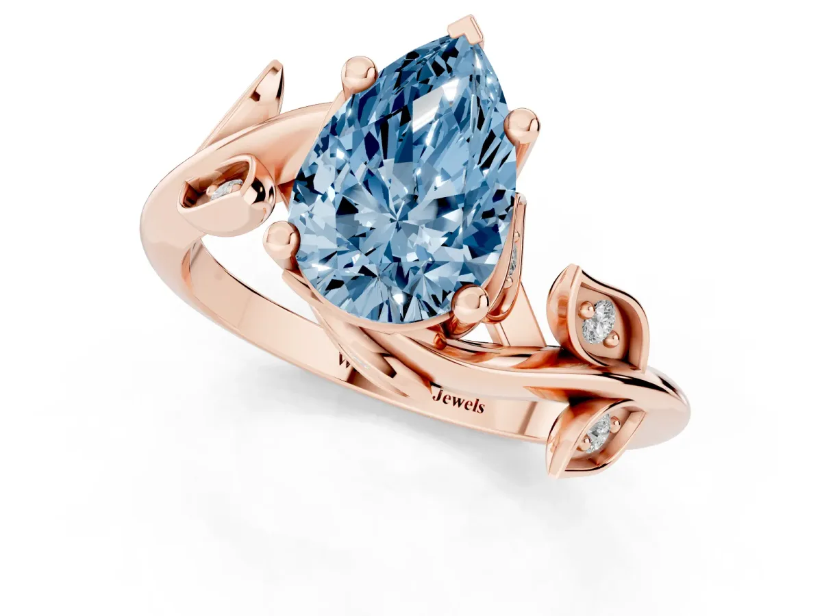Fancy Blue Pear Cut Solitaire Twist Engagement Ring with Leaf Accents and Prong Setting Rose gold
