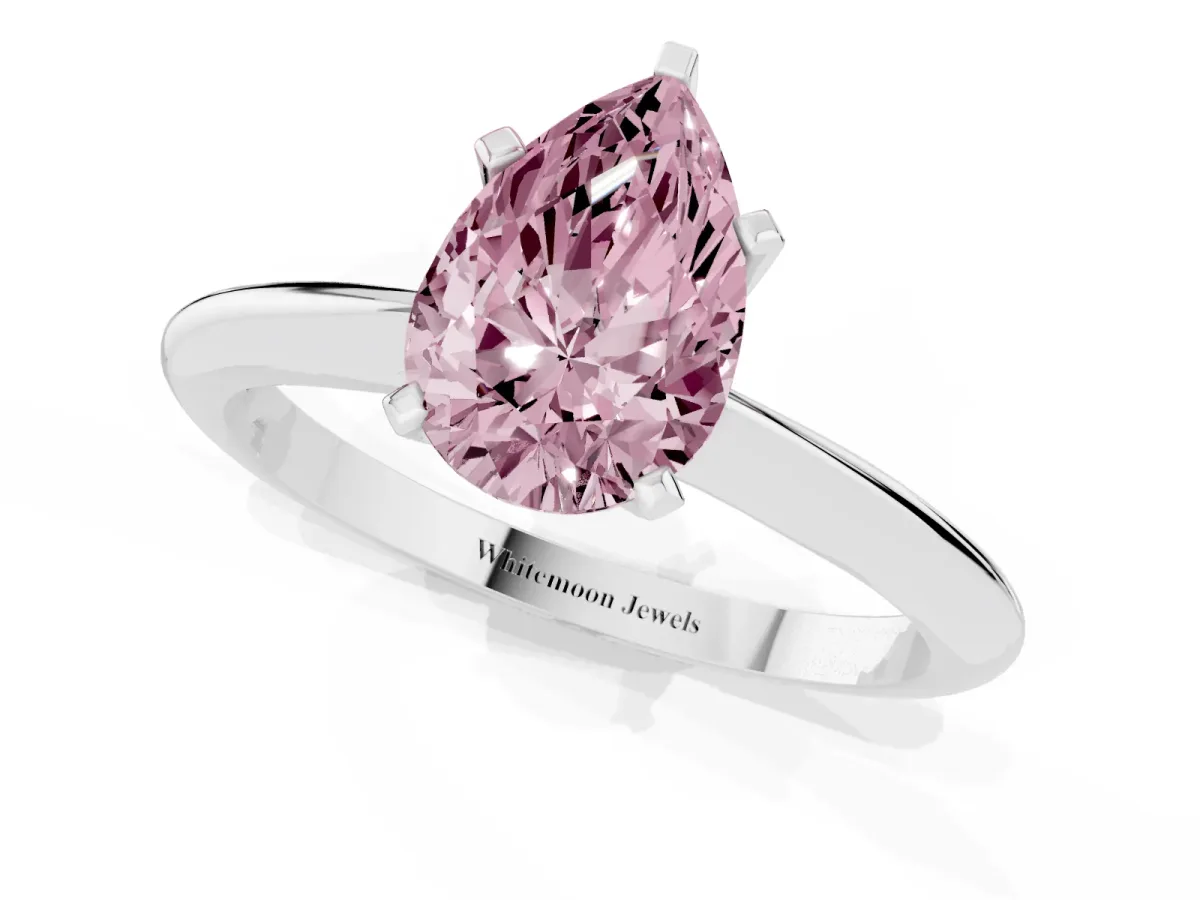 Fancy Pink Pear Cut Cut Solitaire Ring with Four-Prong Setting on a Classic Band Platinum