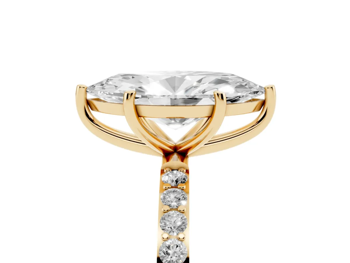 Marquise Cut Diamond Solitaire Ring with Round Pavé Shoulders and Prong Setting Yellow gold