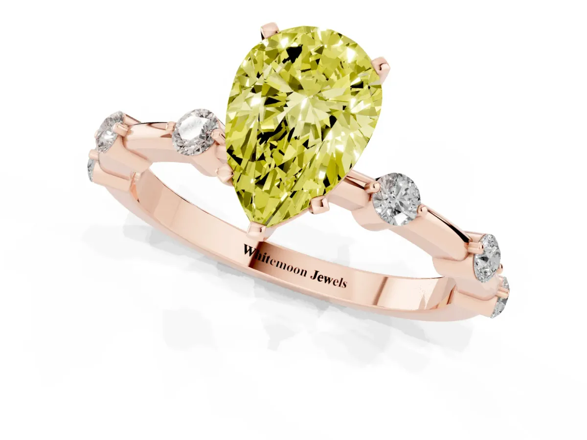 Fancy Yellow Pear Cut Solitaire Diamond Ring with Bezel Set Side Stones and Prong Setting Rose gold