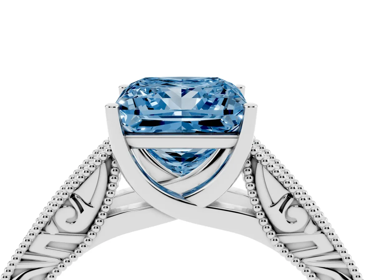 Fancy Blue Princess Cut Diamond Solitaire Ring with Engraved Band and Four-Prong Setting White gold