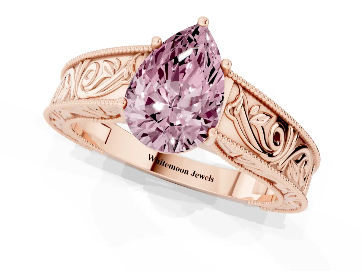 Fancy Pink Pear Cut Diamond Solitaire Ring with Engraved Band and Four-Prong Setting Rose gold
