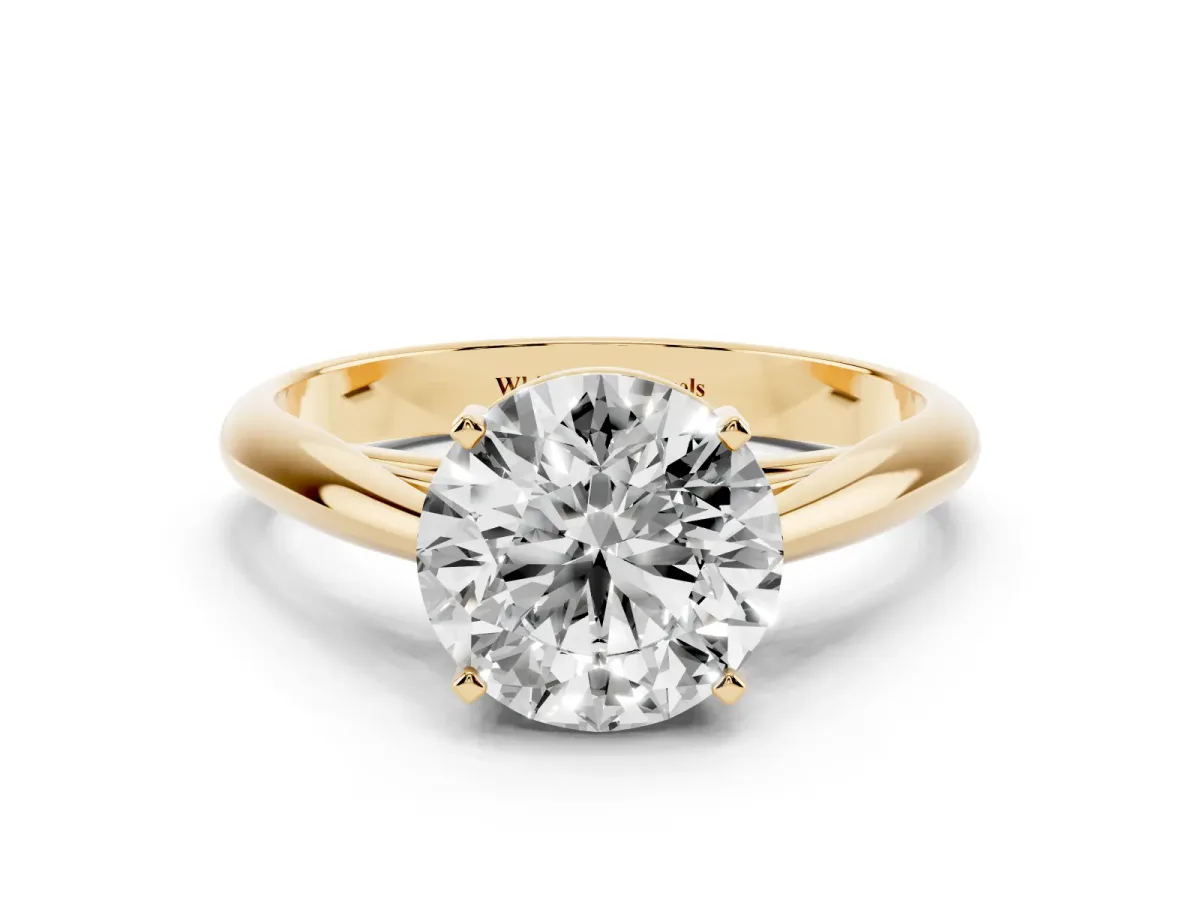 Round Cut Diamond Solitaire Engagement Ring with Cathedral Setting and Four-Prong Mount Yellow gold