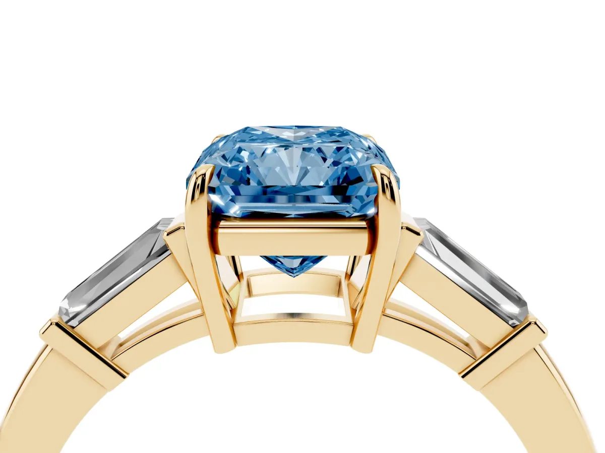 Fancy Blue Radiant Cut Diamond Three-Stone Ring with Tapered Baguette Side Stones and Prong Setting Yellow gold