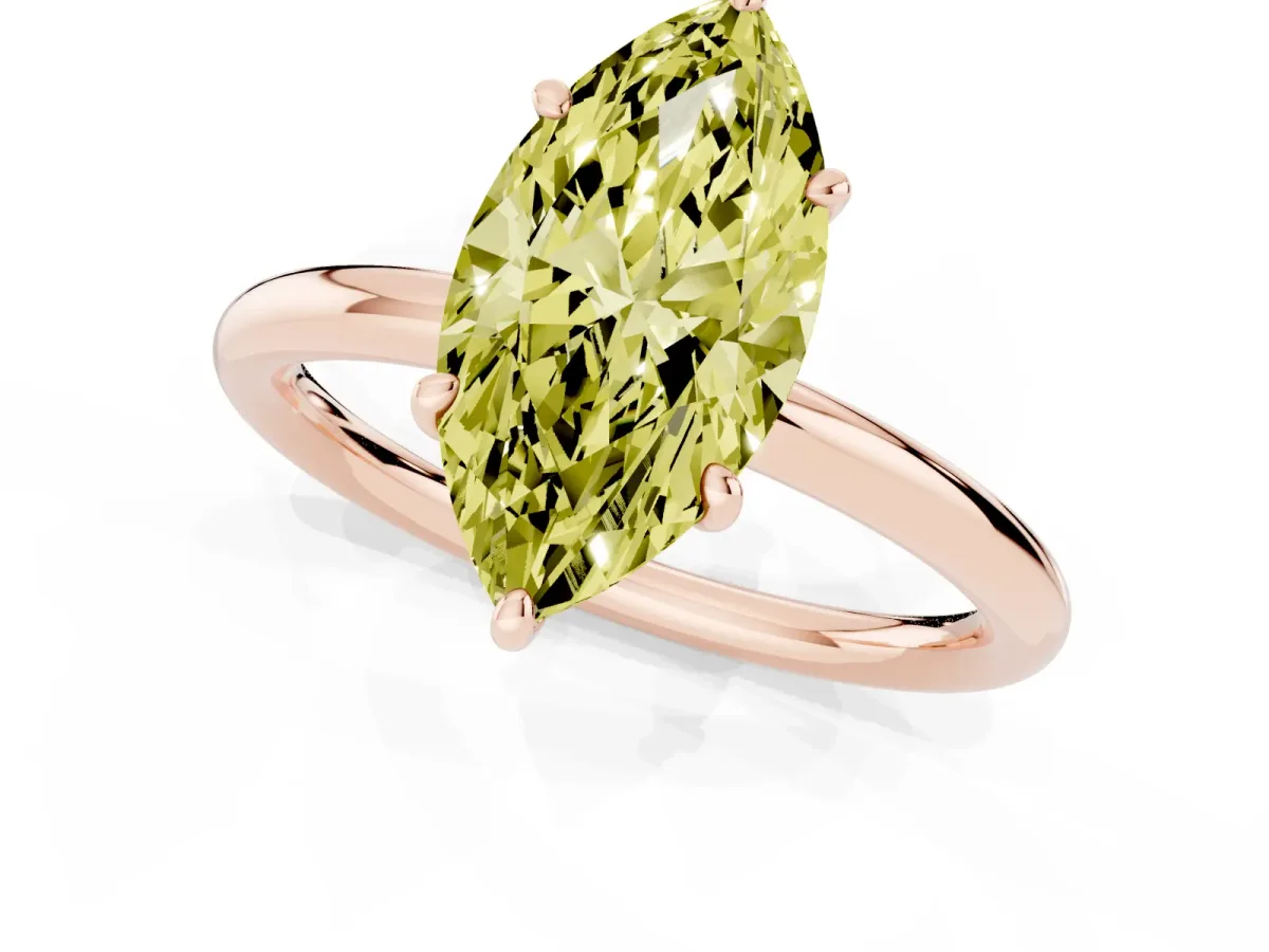 Fancy Yellow Marquise Cut Solitaire Diamond Ring with Four-Prong Setting on a Plain Band Rose gold