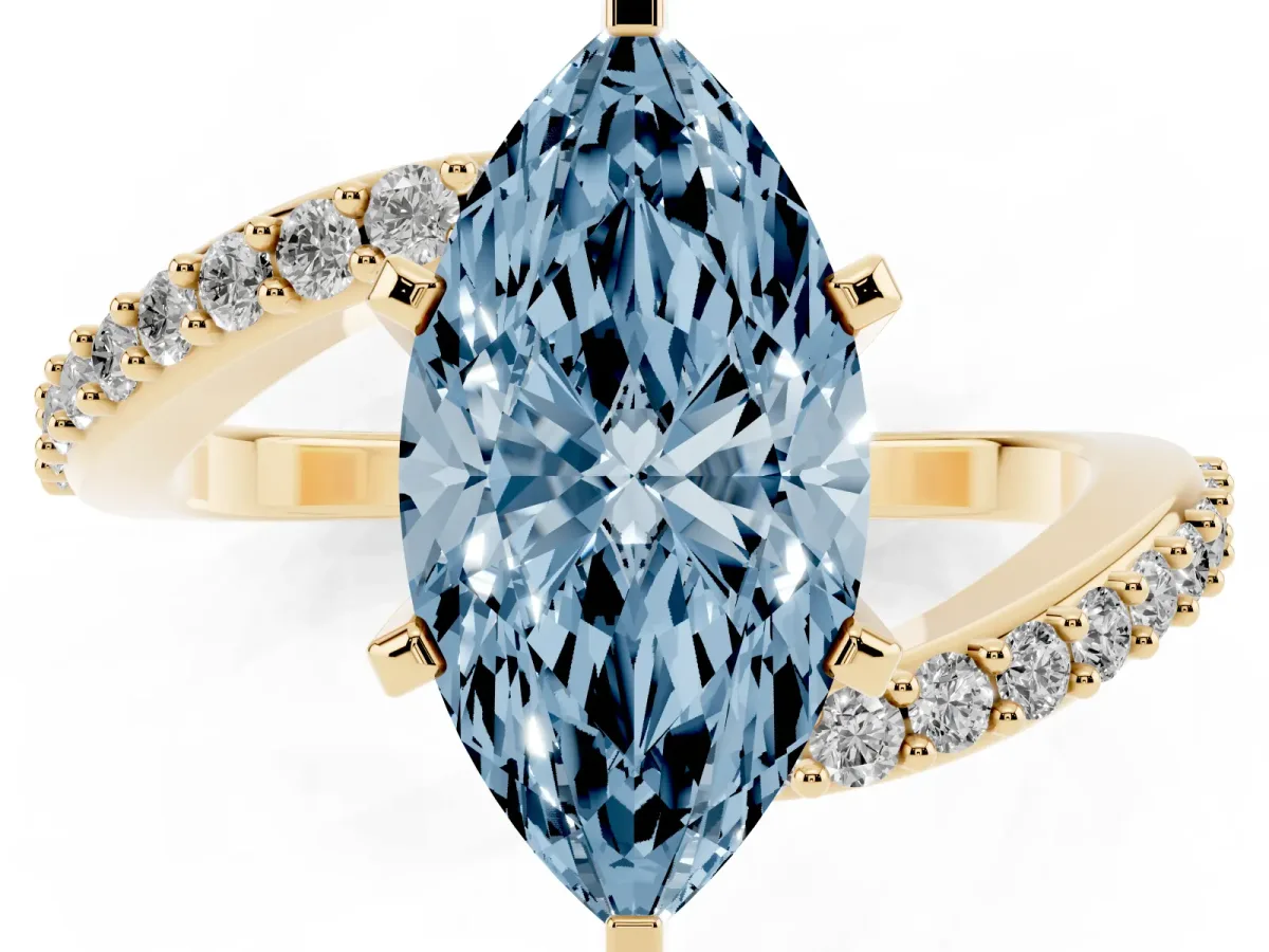 Fancy Blue Marquise Cut Solitaire Twist Band with Pave Set Diamonds and Four-Prong Setting Yellow gold