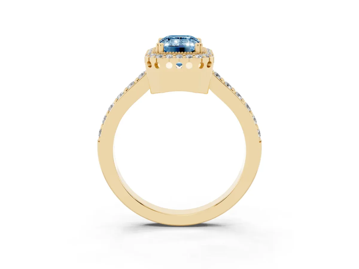 Fancy Blue Emerald Cut Cut Diamond Halo Engagement Ring with Milgrain Detail and Pavé Band Yellow gold