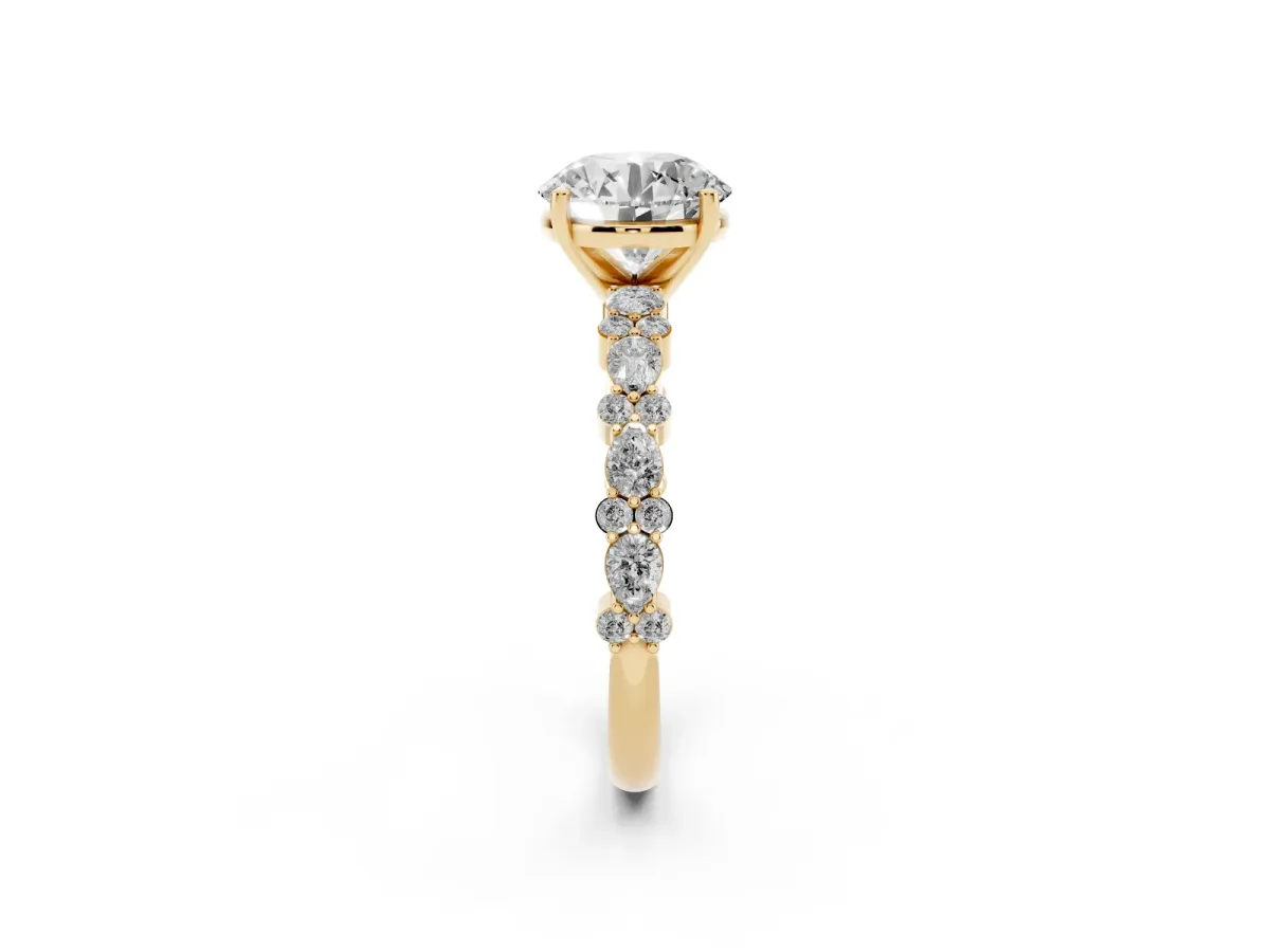 Round Cut Diamond Side Stone Solitaire Ring with Round and Four-Prong Setting Yellow gold