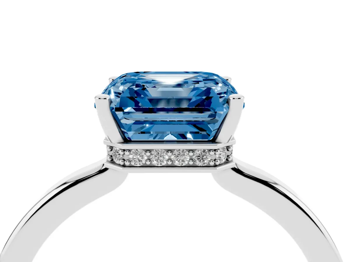 Fancy Blue Asscher Cut Cut Solitaire Engagement Ring with Four-Prong Setting on a Classic Band Silver