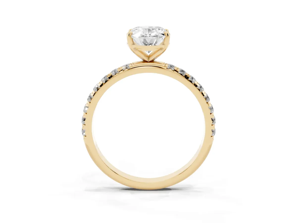 Oval Cut Cut Diamond Solitaire Ring with Micro Pave Band and Four Prong Setting Yellow gold