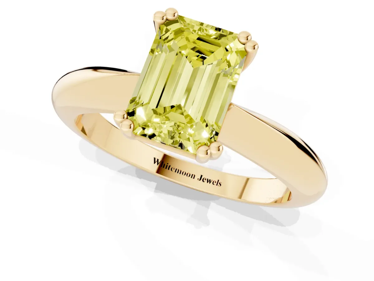 Fancy Yellow Emerald Cut Cut Solitaire Engagement Ring with Tapered Band and Four-Prong Setting Yellow gold