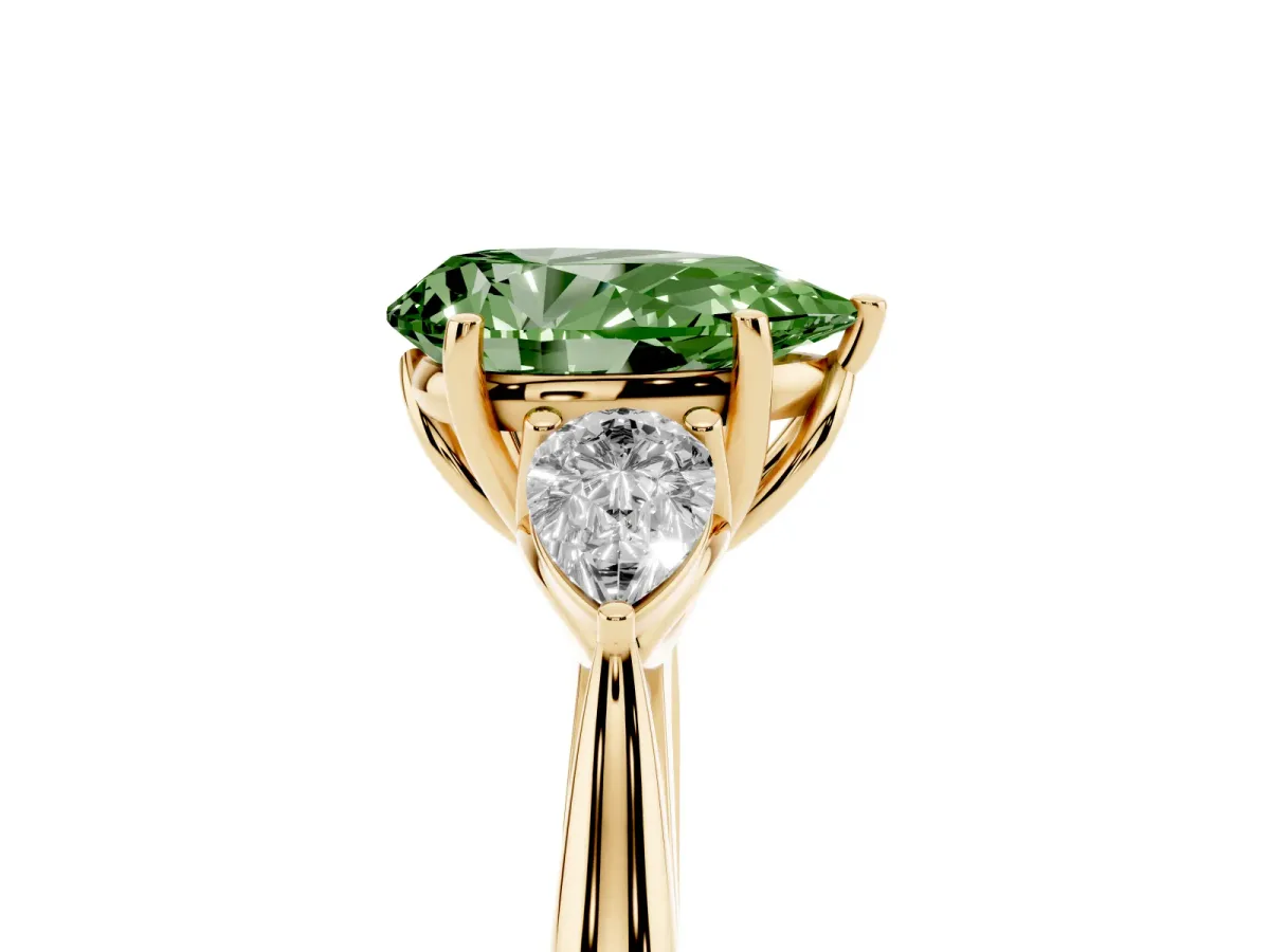Fancy Green Pear Cut Diamond Three-Stone Ring with Pear Side Stones and Prong Setting Yellow gold