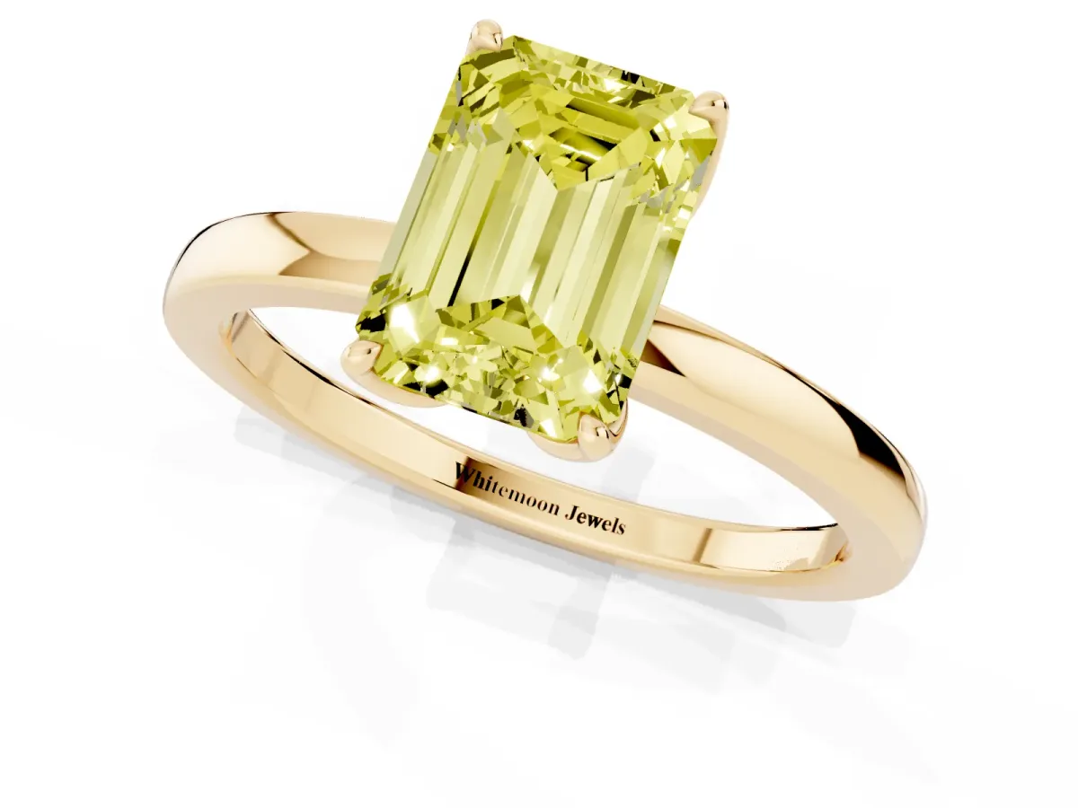 Fancy Yellow Emerald Cut Diamond Solitaire Ring with Thin Band and Prong Setting Yellow gold