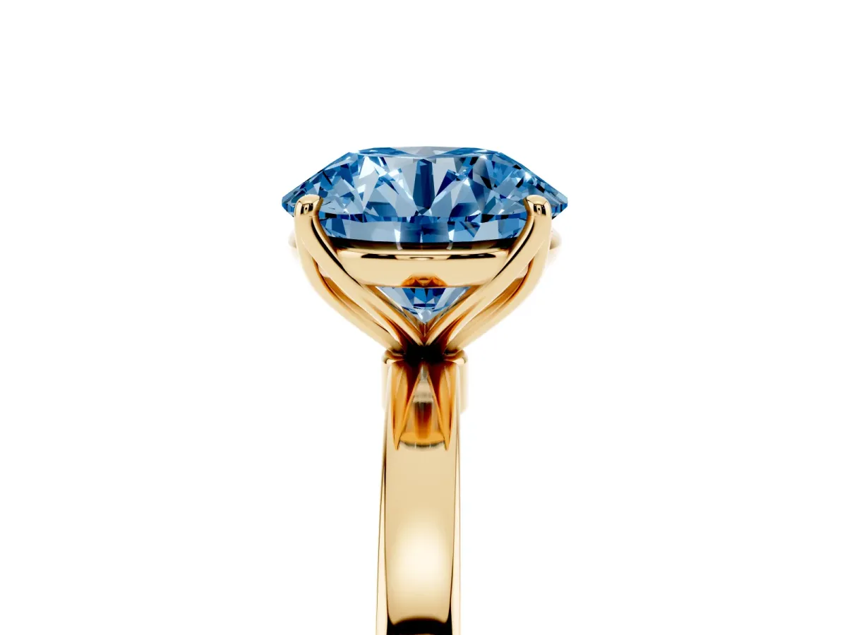 Fancy Blue Round Cut Diamond Solitaire Ring with Thin Band and Prong Setting Yellow gold