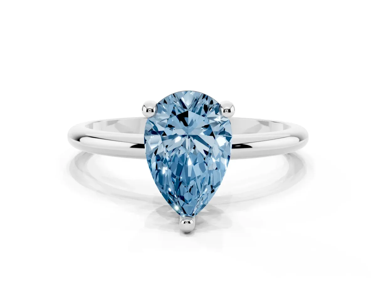 Fancy Blue Pear Cut Solitaire Diamond Ring with 4-Prong Setting on a Classic Band Silver