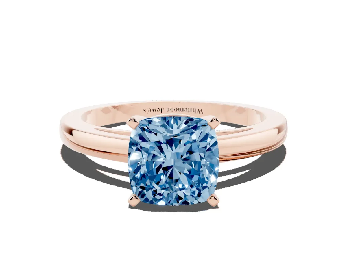 Fancy Blue Cushion Cut Solitaire Diamond Engagement Ring with Four-Prong Setting on a Classic Band Rose gold