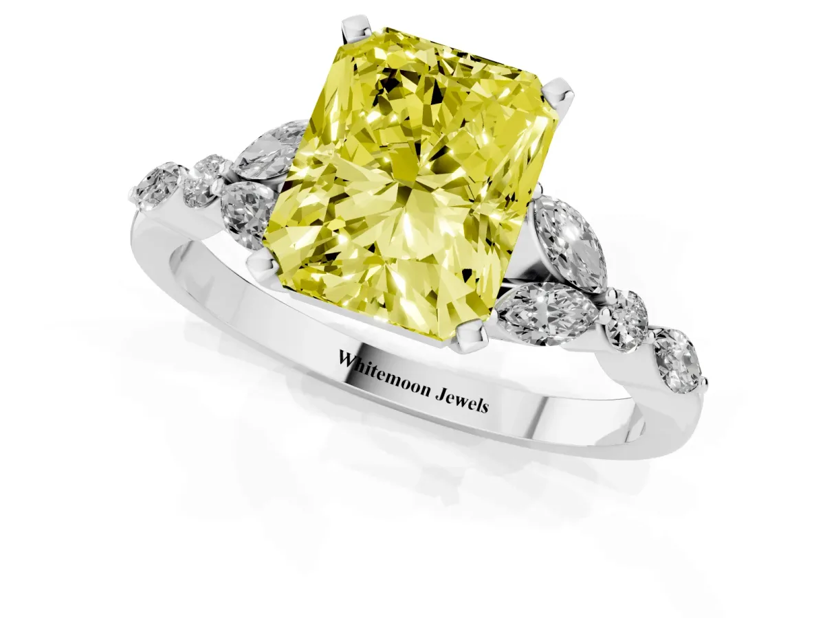 Fancy Yellow Radiant Cut Diamond Solitaire Ring with Side Stones and Four-Prong Setting Silver