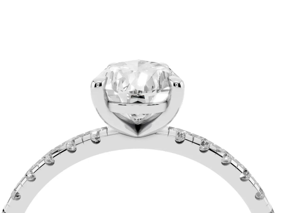 Pear Cut Diamond Brilliant Solitaire Ring with Pavé Band and Four-Prong Setting Silver