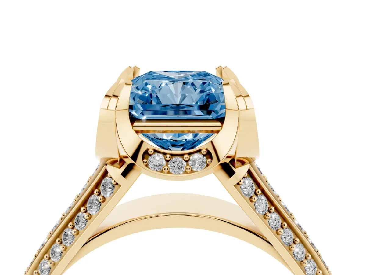 Fancy Blue Radiant Cut Solitaire Pave Split Shank Ring with Four-Prong Setting Yellow gold