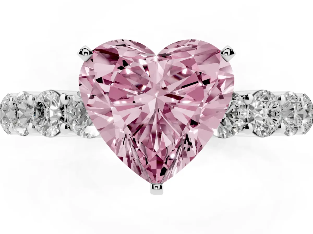 Fancy Pink Heart Cut Diamond Solitaire Ring with Shared Prong Round Side Stones Silver