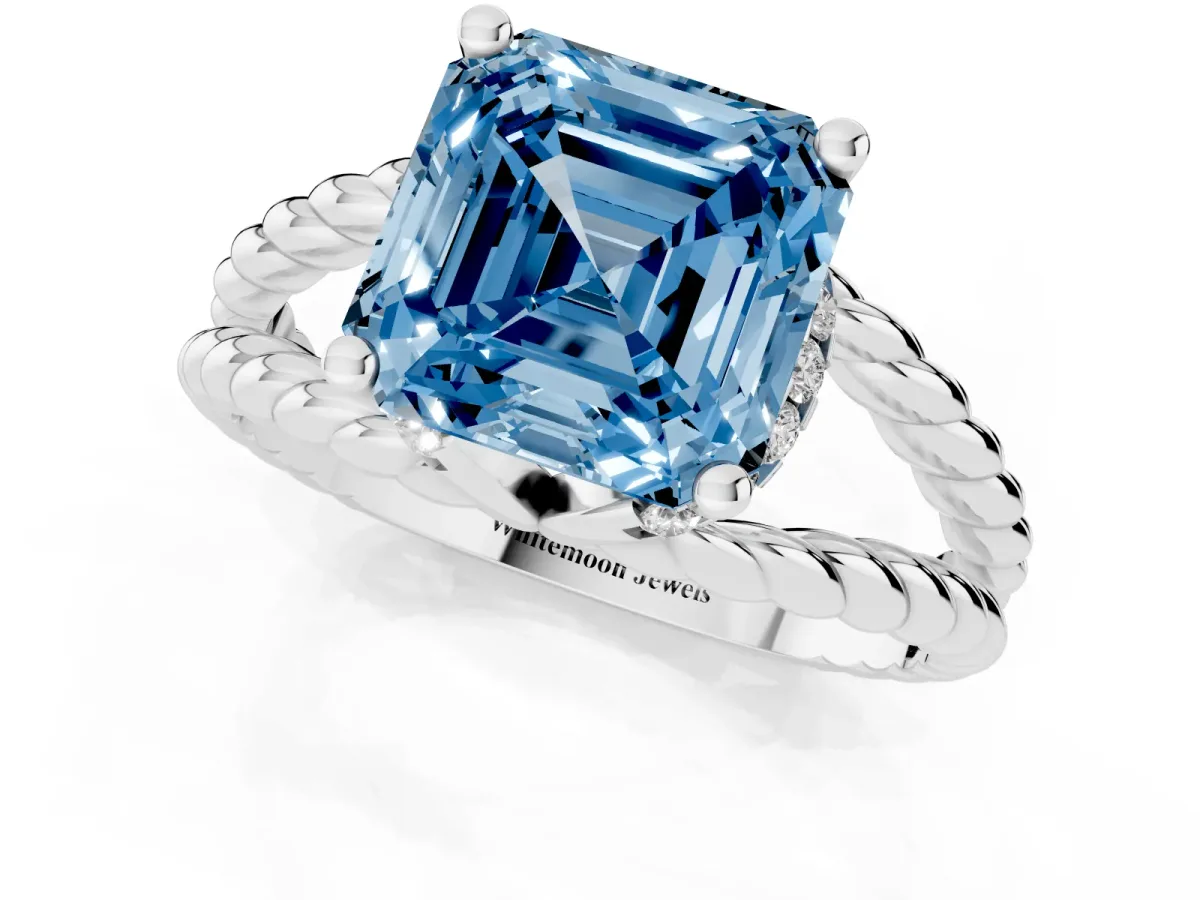 Fancy Blue Asscher Cut Halo Twisted Band Four-Prong Ring Silver