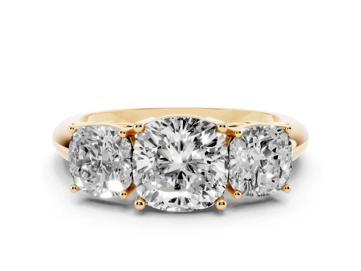 Three-Stone Cushion Cut Cut Diamond Engagement Ring with Prong Setting on a White Gold Band Yellow gold