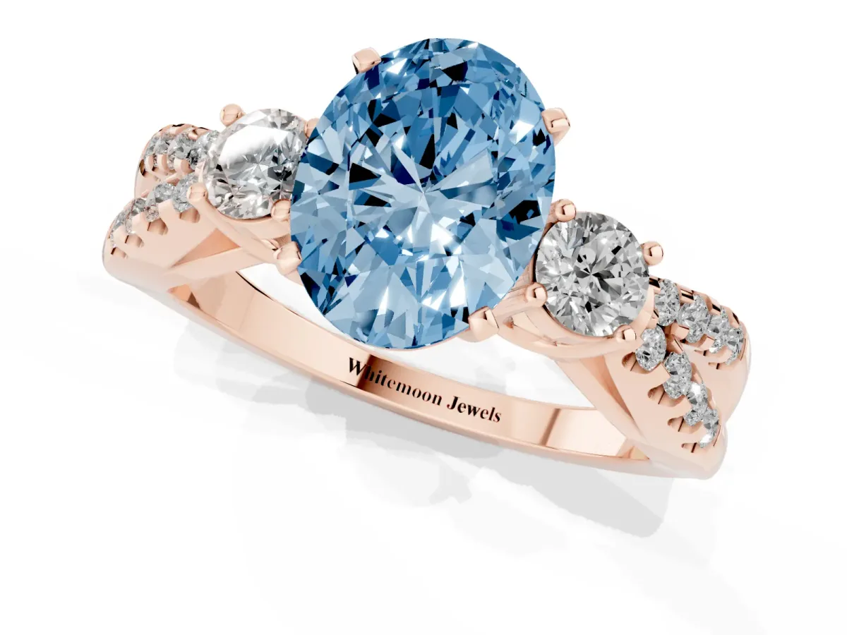 Fancy Blue Oval Cut Diamond Three-Stone Ring with Pavé Split Shank and Four-Prong Setting Rose gold