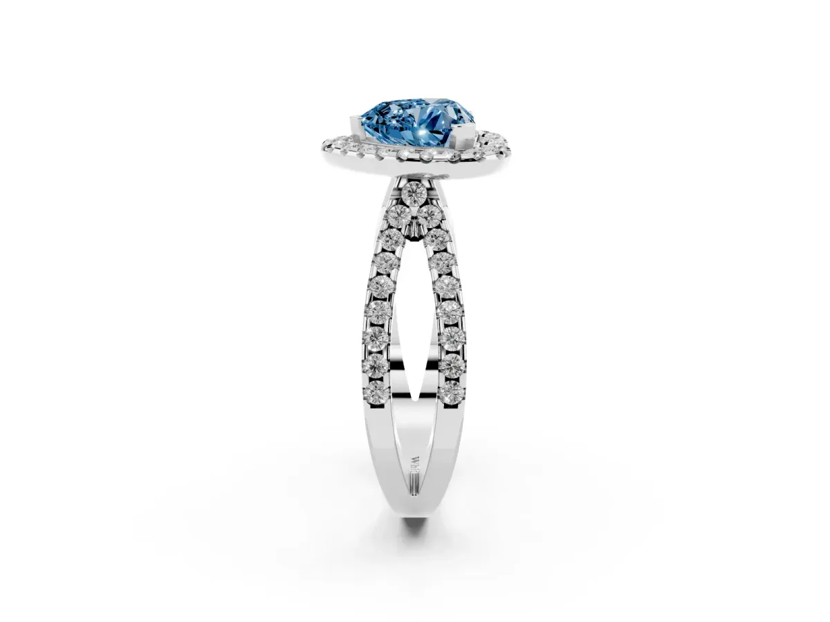 Fancy Blue Heart Cut Diamond Halo Ring with Split Shank Pavé Band and Prong Setting Silver