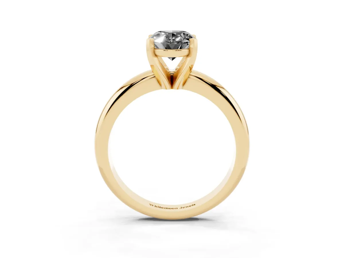 Fancy Black Oval Cut Diamond Solitaire Engagement Ring with Round Band and Four-Prong Setting Yellow gold