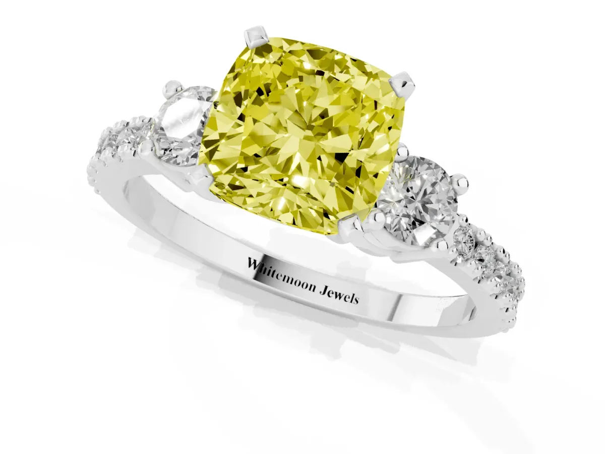 Fancy Yellow Cushion Cut Three-Stone Diamond Pavé Band with Prong Setting Platinum