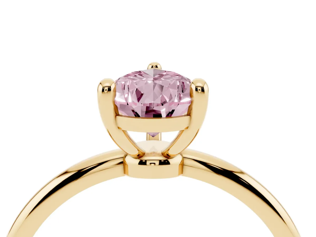 Fancy Pink Pear Cut Solitaire Diamond Ring with 4-Prong Setting on a Classic Band Yellow gold