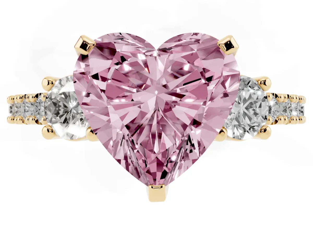 Fancy Pink Heart Cut Three-Stone Diamond Pavé Band with Prong Setting Yellow gold