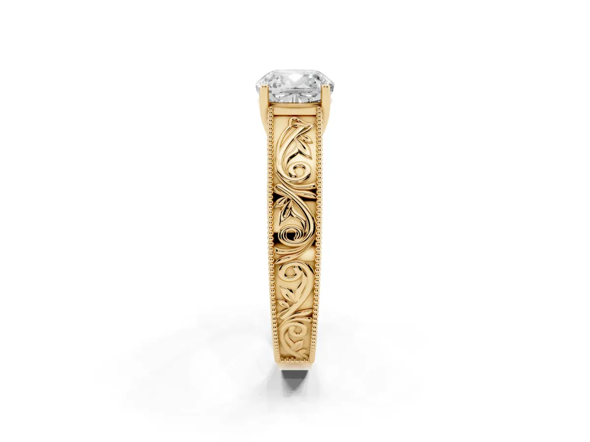 Cushion Cut Diamond Solitaire Ring with Engraved Band and Four-Prong Setting Yellow gold