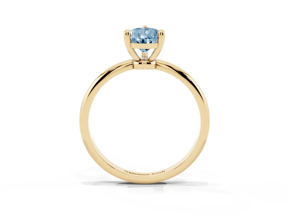 Fancy Blue Pear Cut Solitaire Diamond Ring with 4-Prong Setting on a Classic Band Yellow gold