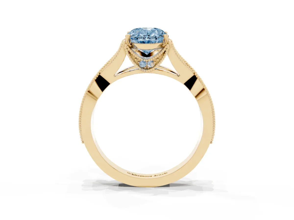 Fancy Blue Oval Cut Cut Diamond Twisted Band with Milgrain Pave Setting and Four-Prong Setting Yellow gold