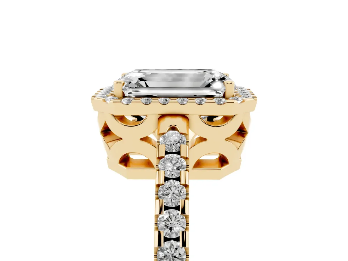 Emerald Cut Diamond Halo Engagement Ring with Pavé Band and Prong Setting Yellow gold